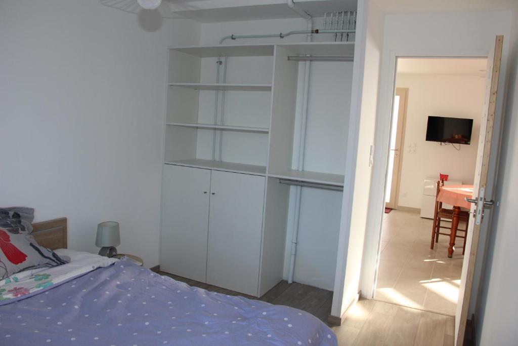 Posteľ alebo postele v izbe v ubytovaní ANCELLE TAILLAS RDC CHALET