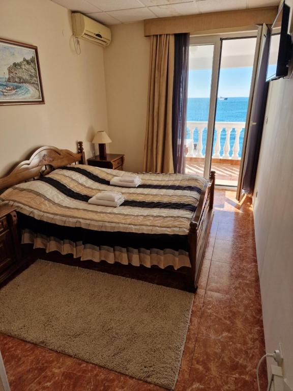 Postel nebo postele na pokoji v ubytování Villa Izvor
