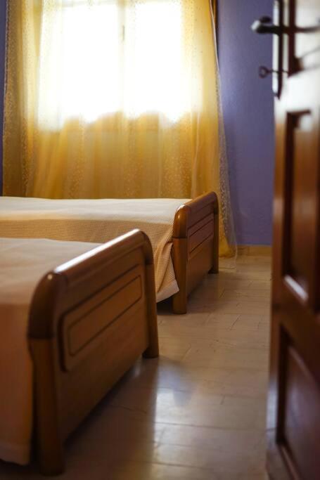A bed or beds in a room at Traditional cozy residence in Lafkos, Pelion