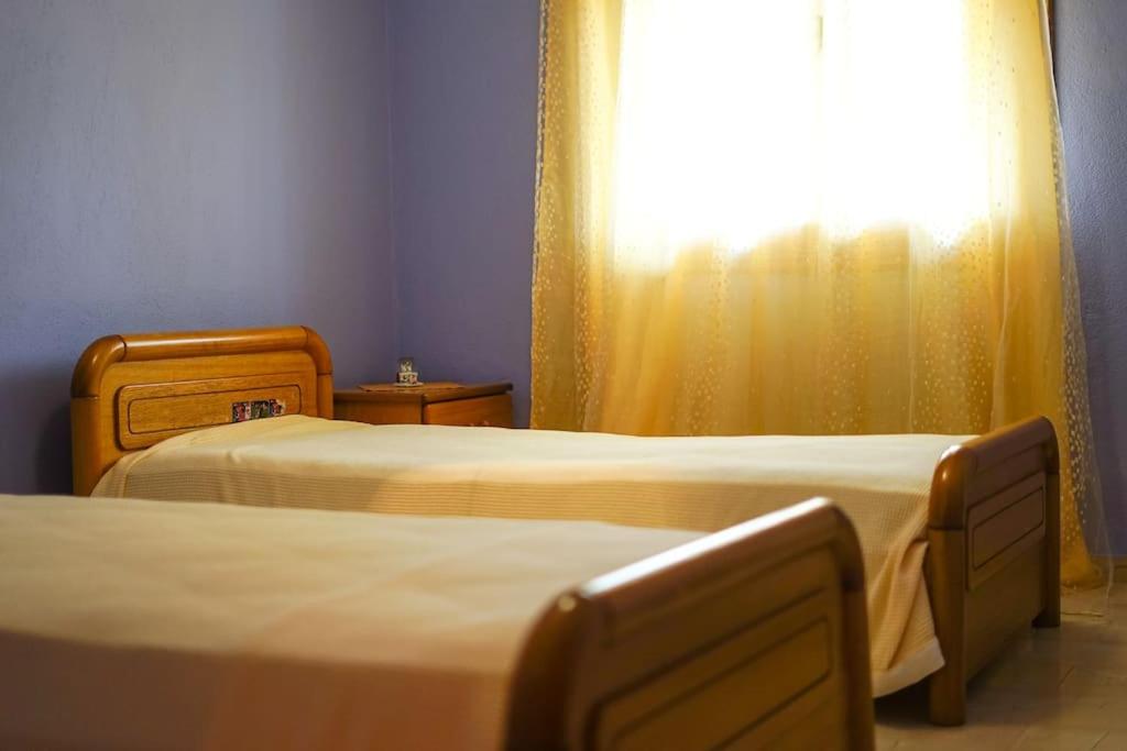 A bed or beds in a room at Traditional cozy residence in Lafkos, Pelion