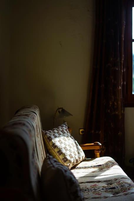 A bed or beds in a room at Traditional cozy residence in Lafkos, Pelion