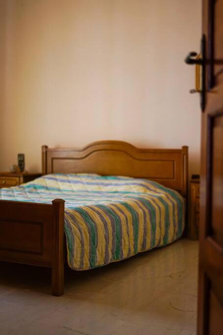 A bed or beds in a room at Traditional cozy residence in Lafkos, Pelion