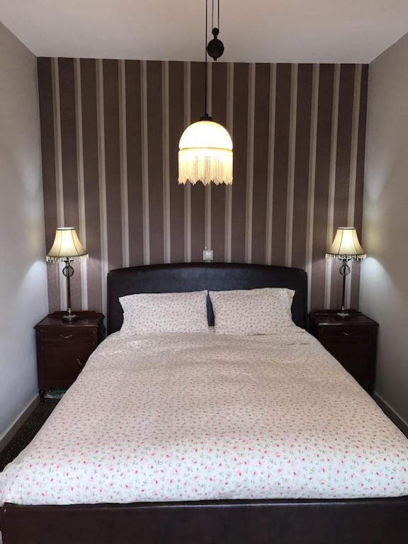 Posteľ alebo postele v izbe v ubytovaní Villa apartment with private garden near the beach