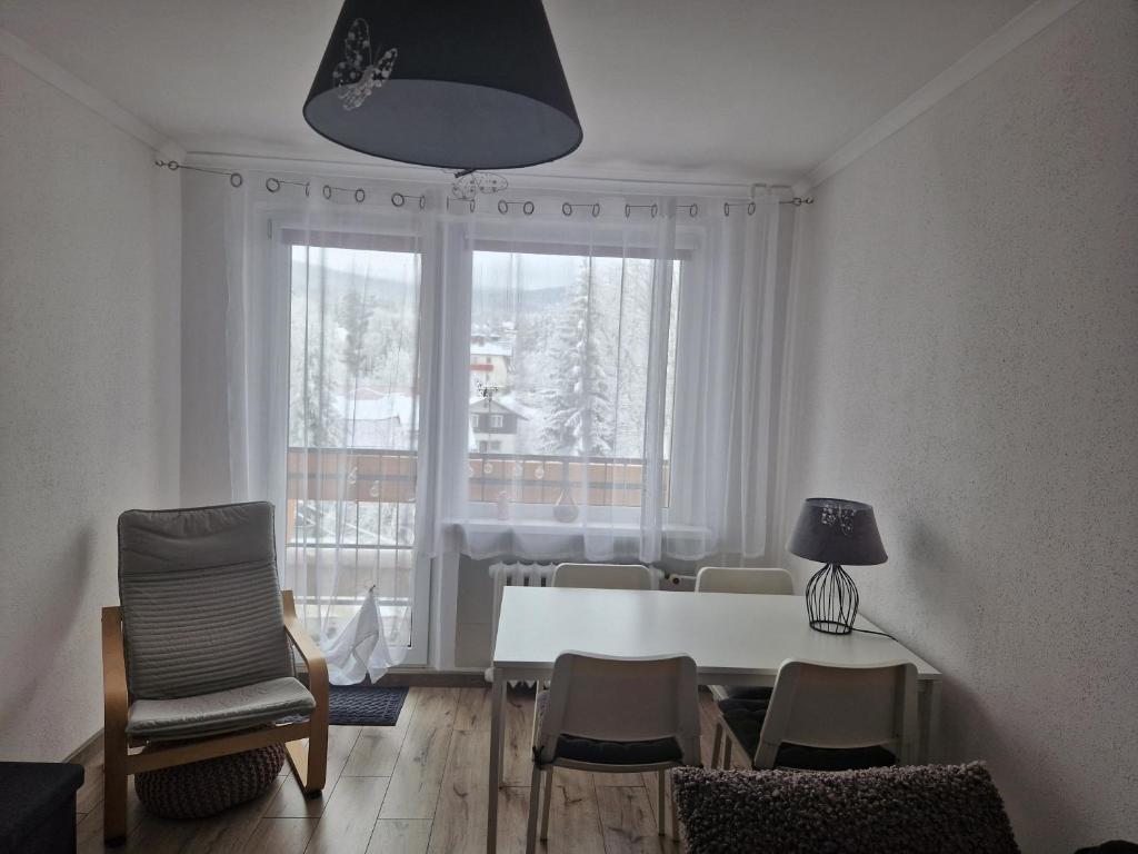 Posedenie v ubytovaní Apartament Górska Panorama