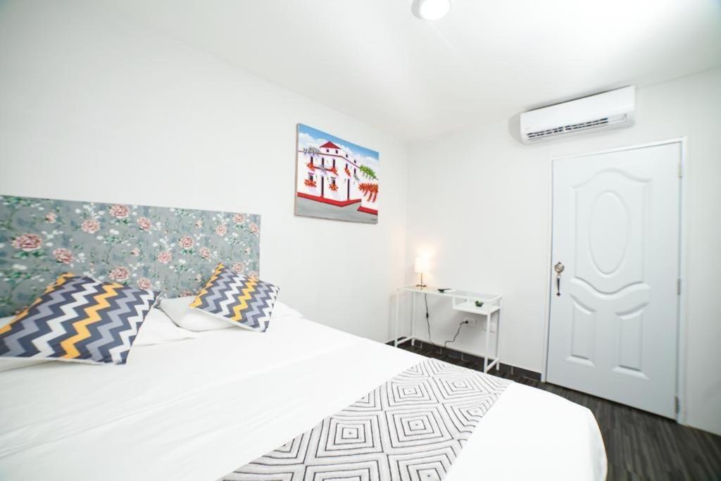 Postel nebo postele na pokoji v ubytování JM GUESTHOUSE
