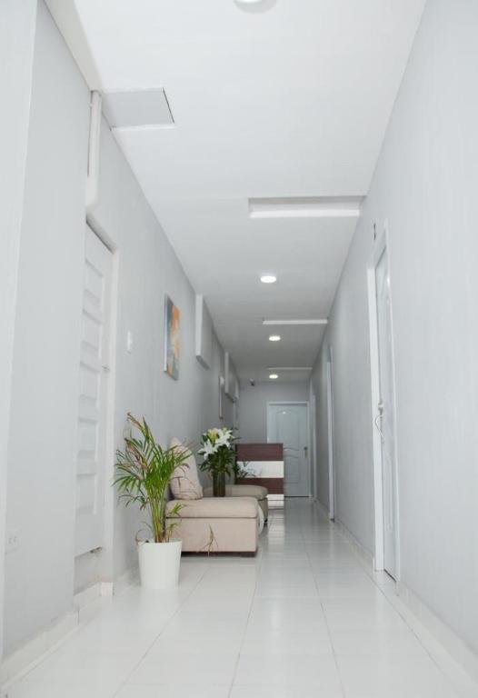 Postel nebo postele na pokoji v ubytování JM GUESTHOUSE