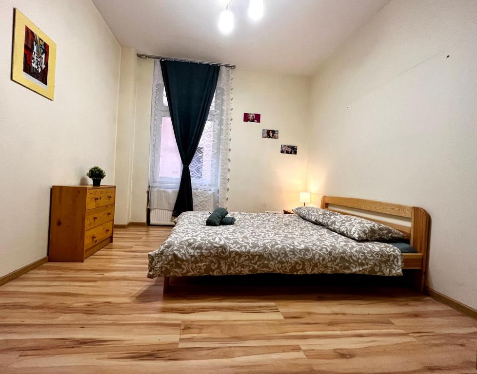 Postel nebo postele na pokoji v ubytování Starowiślna st Apartment