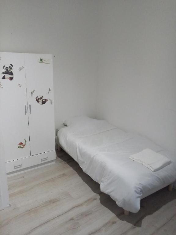 Posteľ alebo postele v izbe v ubytovaní Au p'tit bonheur