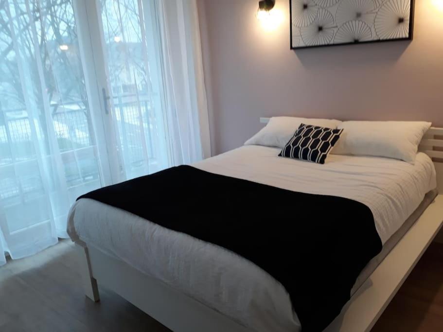Posteľ alebo postele v izbe v ubytovaní Bel appartement centre Rouen avec terrasse