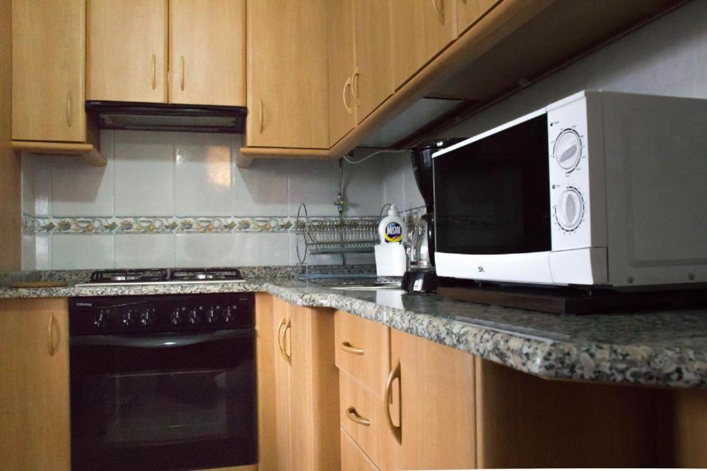 Kuchyň nebo kuchyňský kout v ubytování Apartamentos Gamela en Playa Canido - Vigo