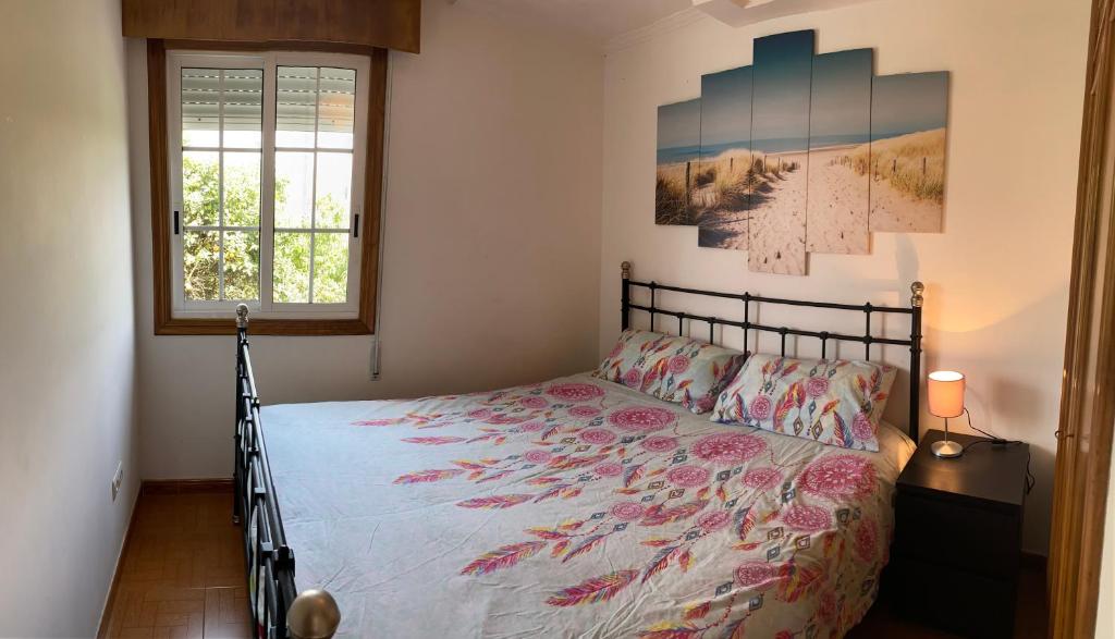 Postel nebo postele na pokoji v ubytování Apartamentos Gamela en Playa Canido - Vigo