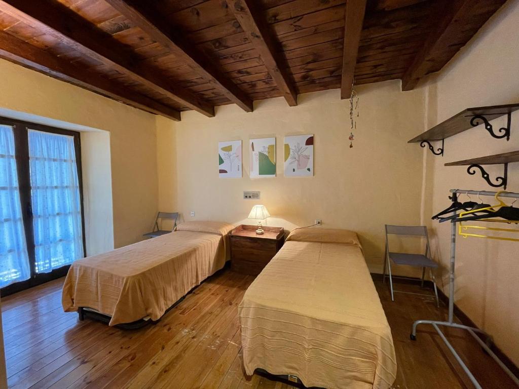 Postel nebo postele na pokoji v ubytování Urbanización Linsoles - Benasque
