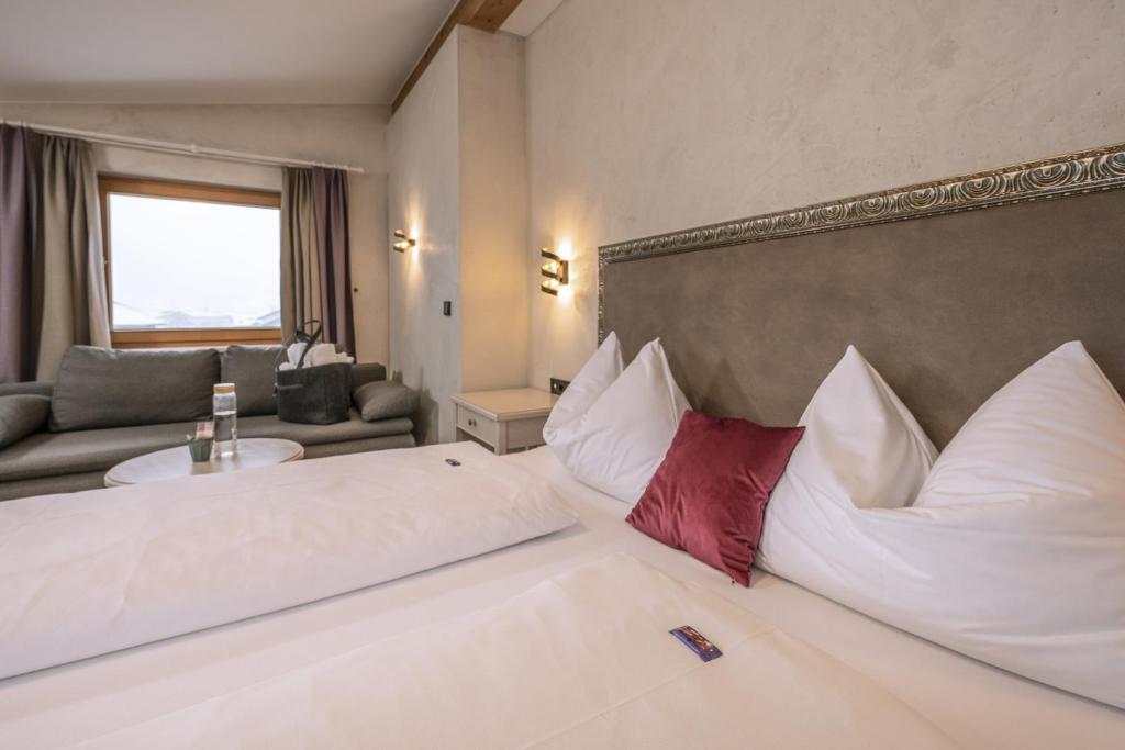 Postel nebo postele na pokoji v ubytování Hotel Acherl