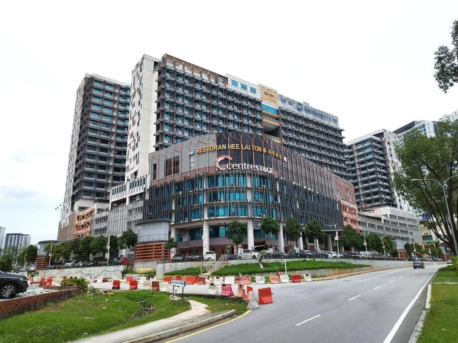a large building on the side of a street at PJ13 1ooMbpsSweetSty3Pax at PJCentrestage in Petaling Jaya