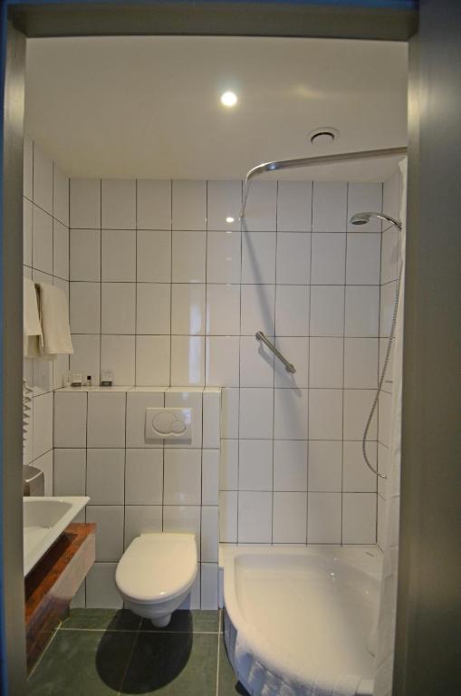 Koupelna v ubytování Hotel Malcot