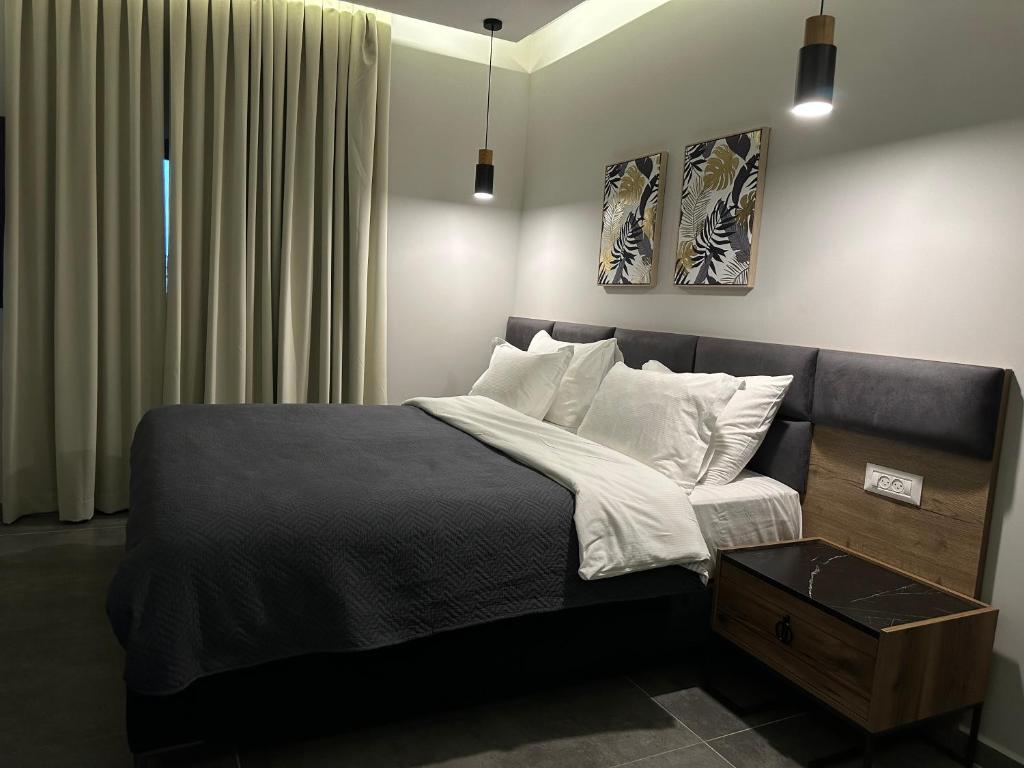 Postel nebo postele na pokoji v ubytování בוטיק רפאל Boutique Rafael