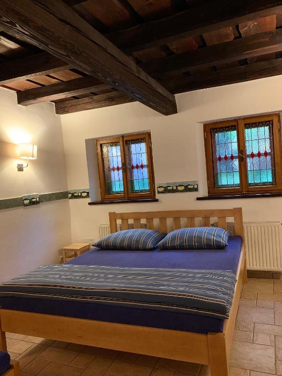Postel nebo postele na pokoji v ubytování VIP MiKU apartman 1