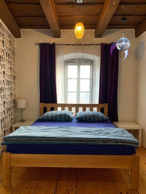 Postel nebo postele na pokoji v ubytování VIP MiKU apartman 2