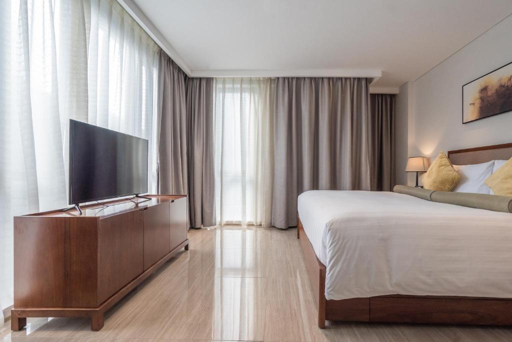 TV a/nebo společenská místnost v ubytování Oakwood Hotel & Residence Suzhou