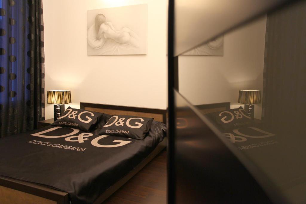 Postel nebo postele na pokoji v ubytování Ekaterina Hotel
