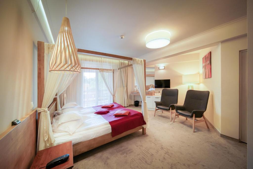 TV a/nebo společenská místnost v ubytování Hotel Szeifert