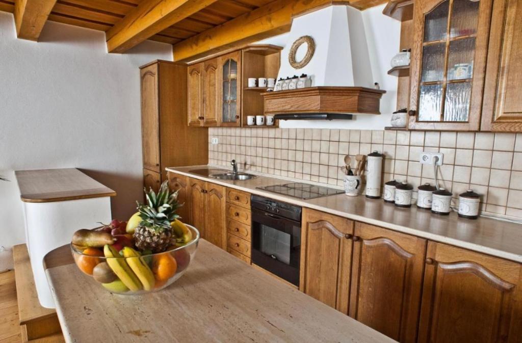 Kuchyň nebo kuchyňský kout v ubytování VIP MiKU apartman 2