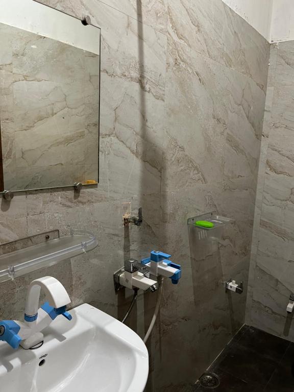 Koupelna v ubytování Prabhu Sadan home stay