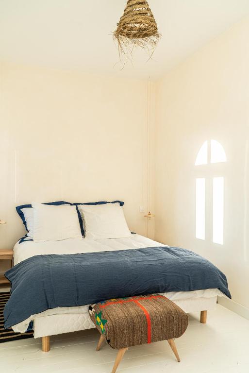 Postel nebo postele na pokoji v ubytování Maison Cachée - Chambres et Appartements en Baie de Somme