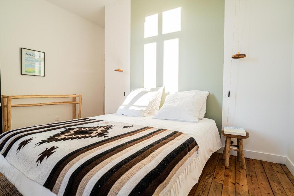 Postel nebo postele na pokoji v ubytování Maison Cachée - Chambres et Appartements en Baie de Somme