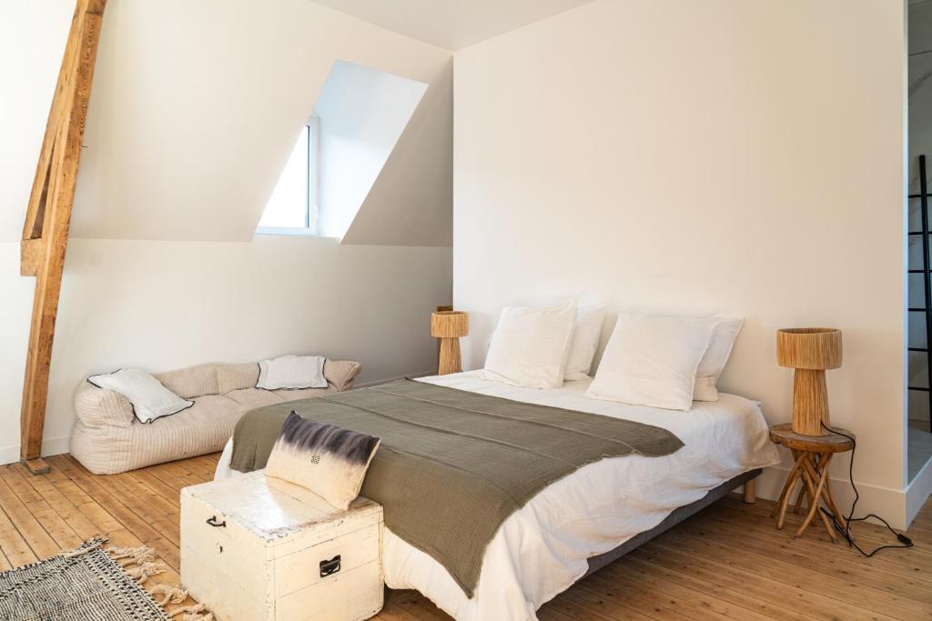Postel nebo postele na pokoji v ubytování Maison Cachée - Chambres et Appartements en Baie de Somme