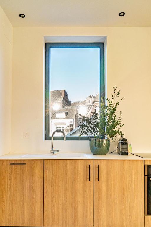 Kuchyň nebo kuchyňský kout v ubytování Maison Cachée - Chambres et Appartements en Baie de Somme