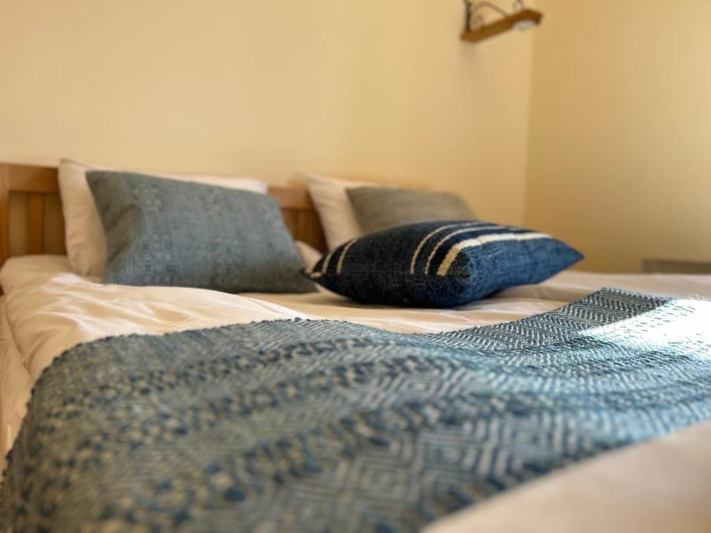 Postel nebo postele na pokoji v ubytování Saryan Guesthouse