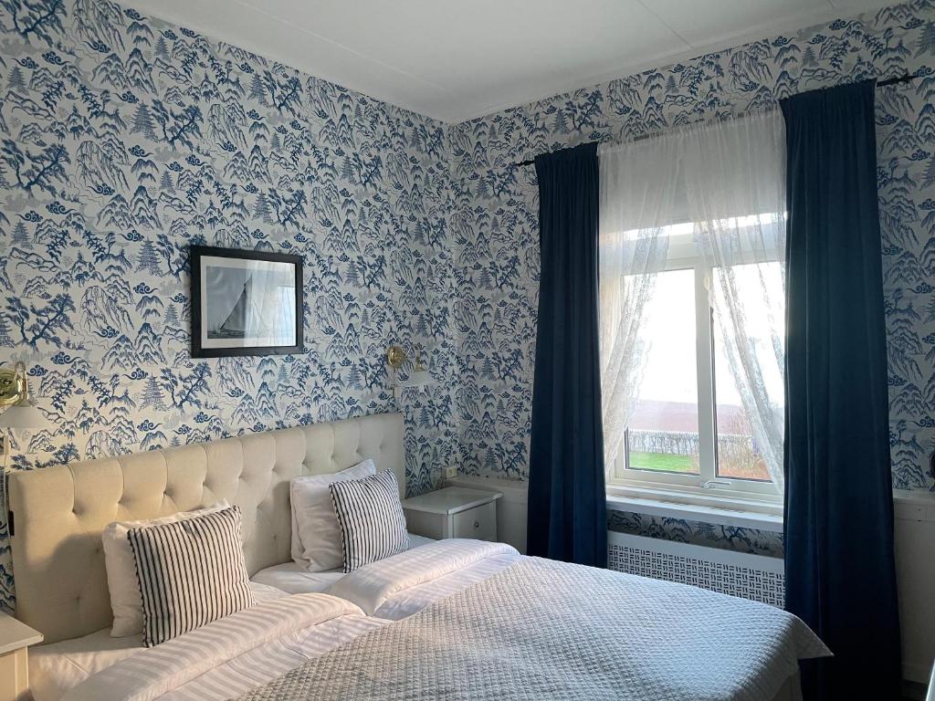 Voodi või voodid majutusasutuse Nautic Hotell toas