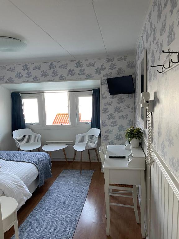 Voodi või voodid majutusasutuse Nautic Hotell toas