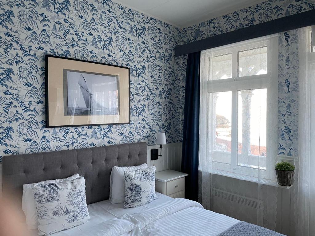 Voodi või voodid majutusasutuse Nautic Hotell toas