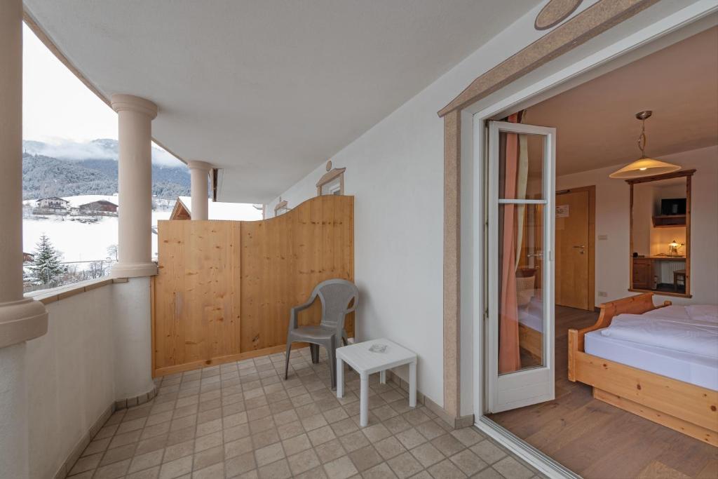 Postel nebo postele na pokoji v ubytování Cristallo B&B