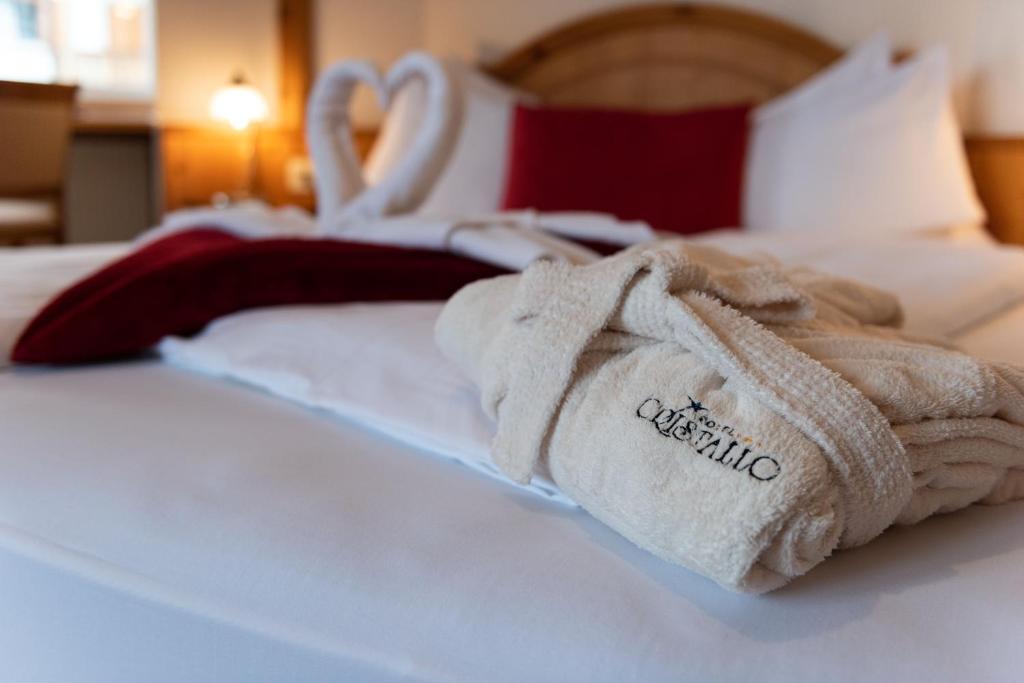 Postel nebo postele na pokoji v ubytování Cristallo B&B