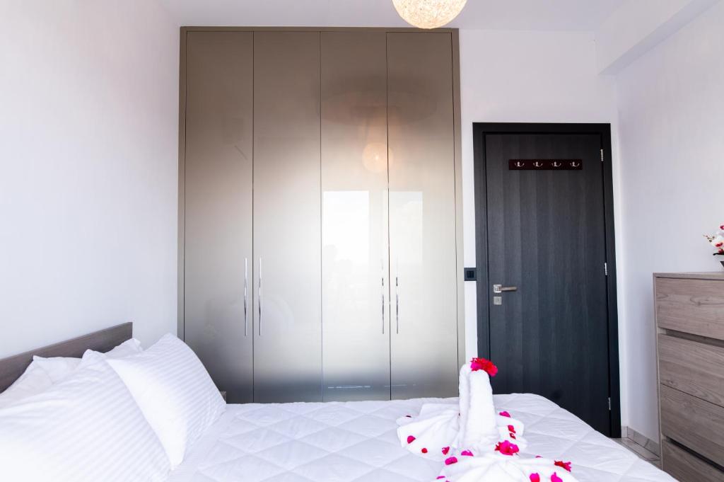 Postel nebo postele na pokoji v ubytování Sebastian Luxury Homes