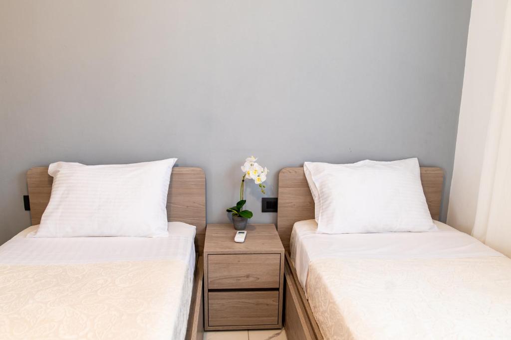 Postel nebo postele na pokoji v ubytování Sebastian Luxury Homes