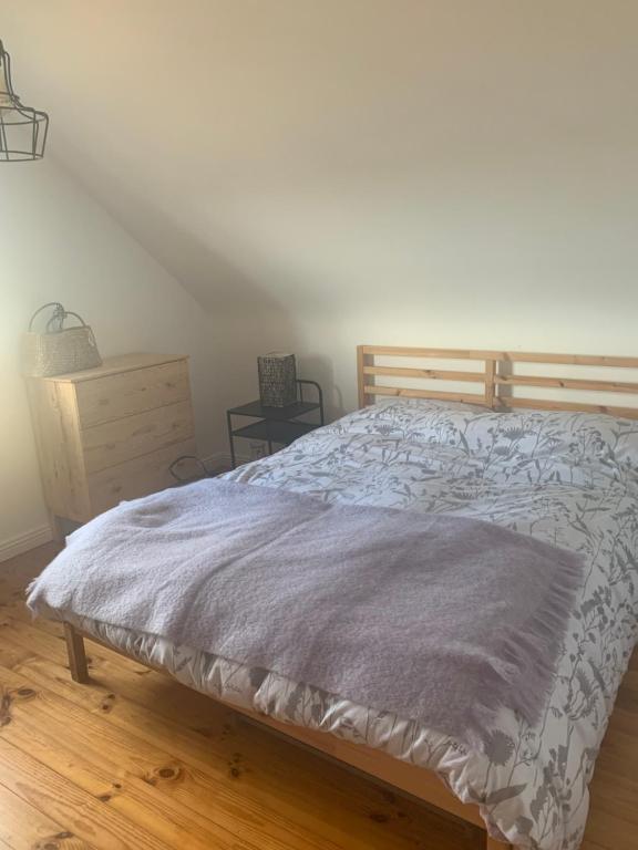 Postel nebo postele na pokoji v ubytování Pink Cottage