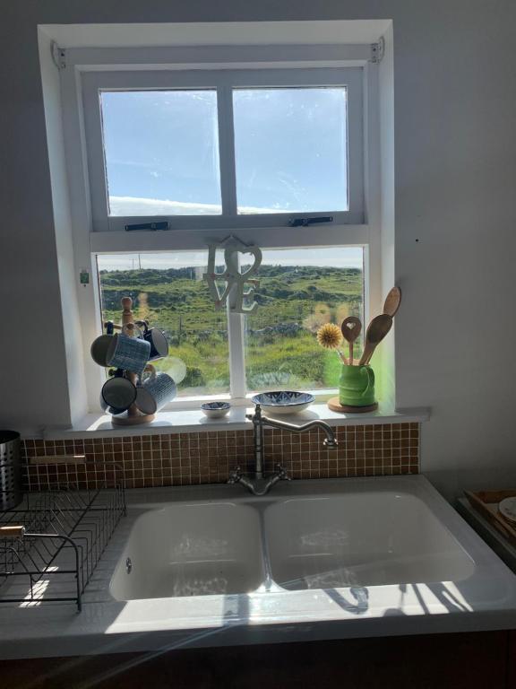 Fotografie z fotogalerie ubytování Pink Cottage v destinaci Ballyconneely
