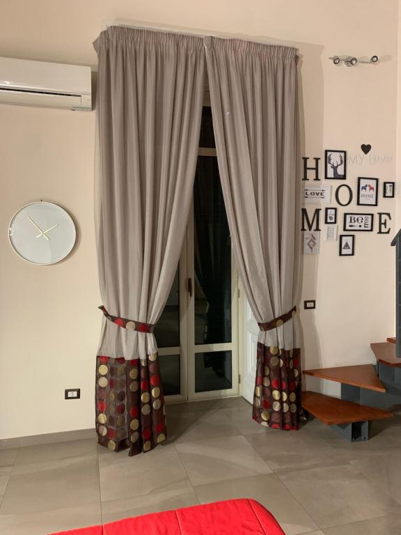 A bed or beds in a room at FORIA 58 APARTAMENTS