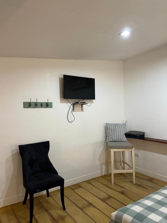 TV a/nebo společenská místnost v ubytování Island House Rentals 48
