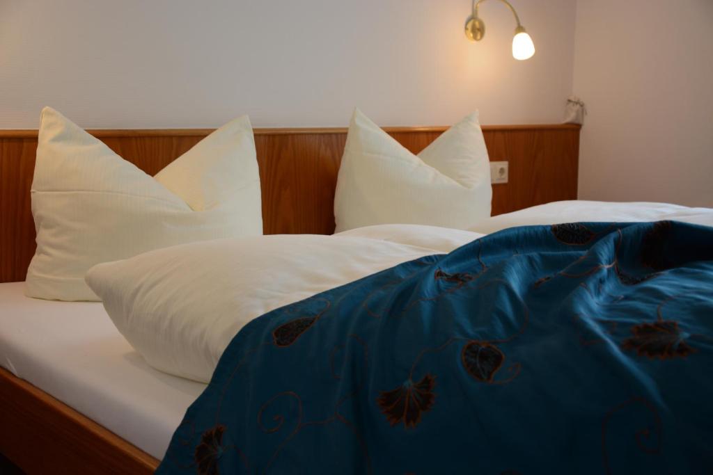 Postel nebo postele na pokoji v ubytování Hotel Hochwald