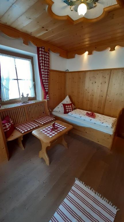 Postel nebo postele na pokoji v ubytování Schlosserhof