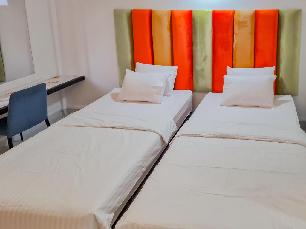 Sans Hotel Grand Sabaraya Cikampek - Camera Doppia Deluxe