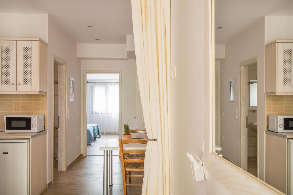 Kuchyň nebo kuchyňský kout v ubytování Spiti Prifti Apartments