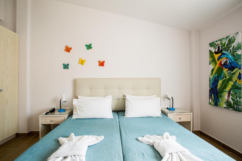 Postel nebo postele na pokoji v ubytování Spiti Prifti Apartments