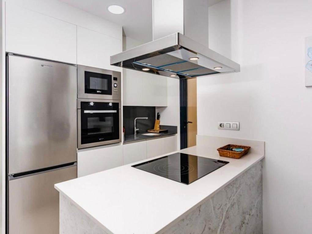 Kuchyňa alebo kuchynka v ubytovaní JERAMY Appartement