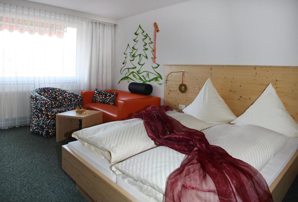 Postel nebo postele na pokoji v ubytování Hotel Hochwald